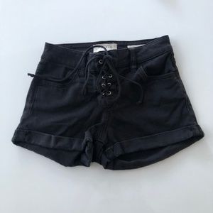 PacSun black super stretch shortie denim shorts. Size 23